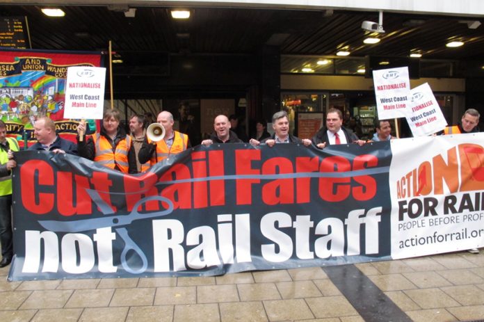 Rail unions demonstrating outside Euston station last October against the West Coast Mainline tendering scandal