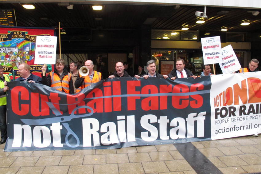 Rail unions demonstrating outside Euston station last October against the West Coast Mainline tendering scandal