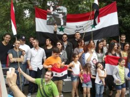 Syrians in London demonstrating in support of President Assad – Hezbollah is ready to send its fighters to defeat the imperialist-backed terrorists