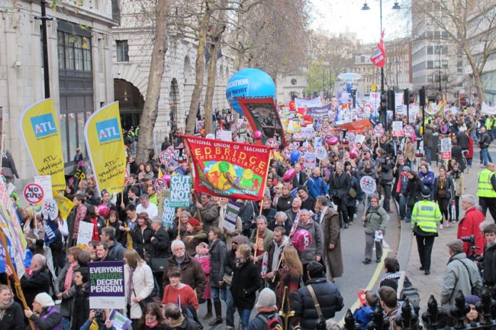 Teachers march during a national public sector strike in defence of pensions