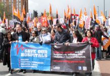 Tens of thousands marched in April against the planned closure of four west London A&Es. Ex-Labour Health Secretary Hewitt supports closing NHS hospitals and sending patients to India