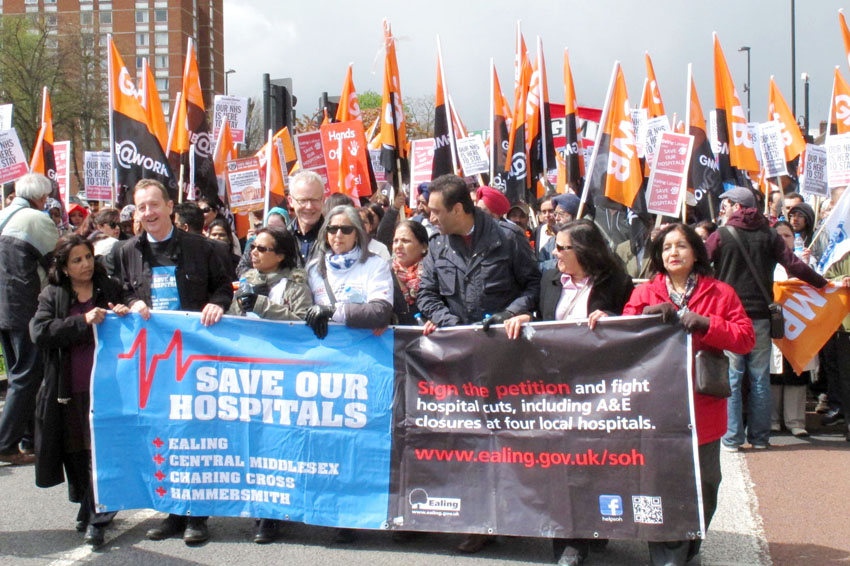 Tens of thousands marched in April against the planned closure of four west London A&Es. Ex-Labour Health Secretary Hewitt supports closing NHS hospitals and sending patients to India
