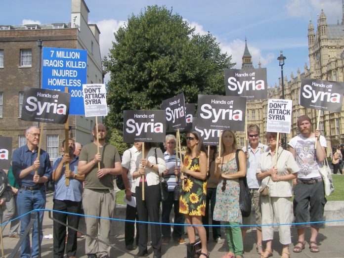 The demonstration outside the House of Commons yesterday afternoon demanding that the UK and US keep their hands off Syria