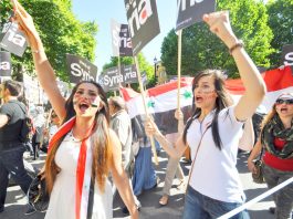 Young girls marching past Downing Street chanted ‘Hands off Syria’