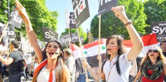 Young girls marching past Downing Street chanted ‘Hands off Syria’