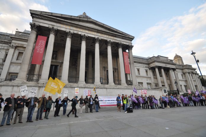 Campaigners against cuts in art and culture funding created a human chain circle outside the National Gallery in Trafalgar Square