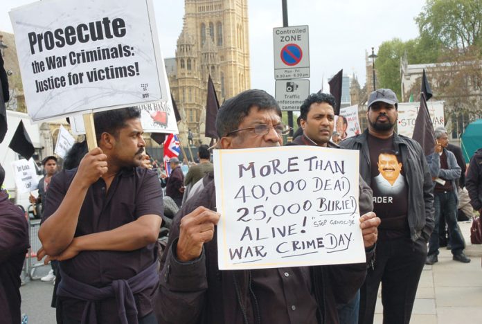 Tamils at a rally in London in May 2010 the anniversary of the Sri Lankan army massacre of over 40,000 Tamils at Mullivaikkal