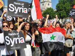 Demonstrators demanding ‘Hands off Syria’ after the demonstration in London on August 31