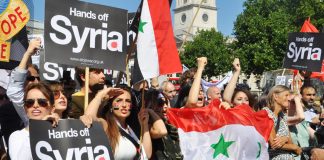 Demonstrators demanding ‘Hands off Syria’ after the demonstration in London on August 31