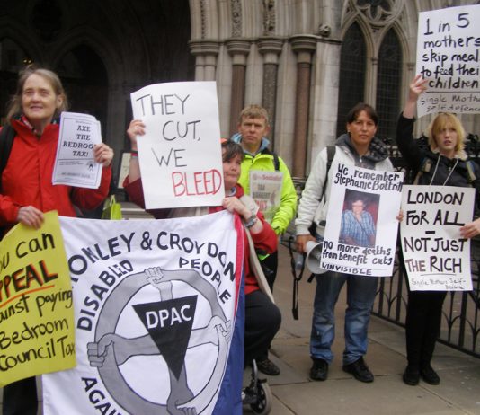 Protest against benefit cuts outside the High Court in London earlier this year