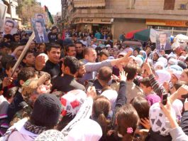 A demonstration in support of President Assad in Midan