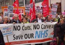 Unite General Secretary LEN McCLUSKEY (centre) heading a march in London in defence of the NHS in May