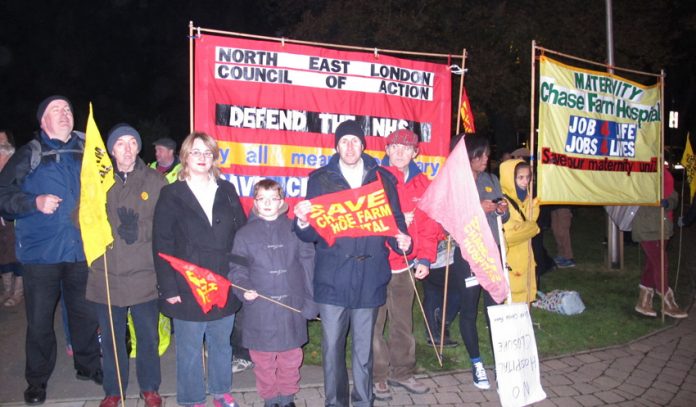 Enfield residents and trade unionists assemble on Thursday night before marching to Chase Farm Hospital, determined to keep it open