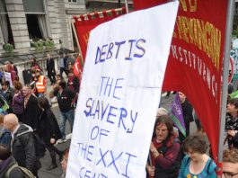 Cuts Are Hitting The Poor Hardest Placard on the TUC demonstration of October 20 2012