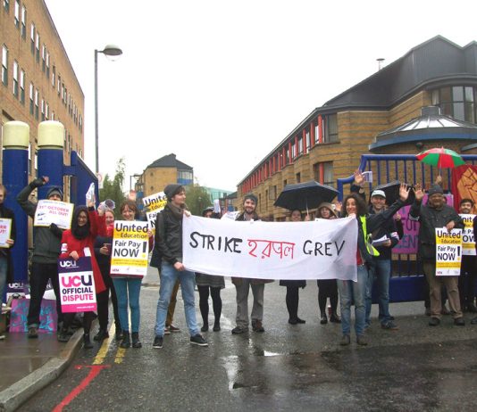 Lecturers, university staff and students on the picket line outside Queen Mary University in East London during their last strike on October 31