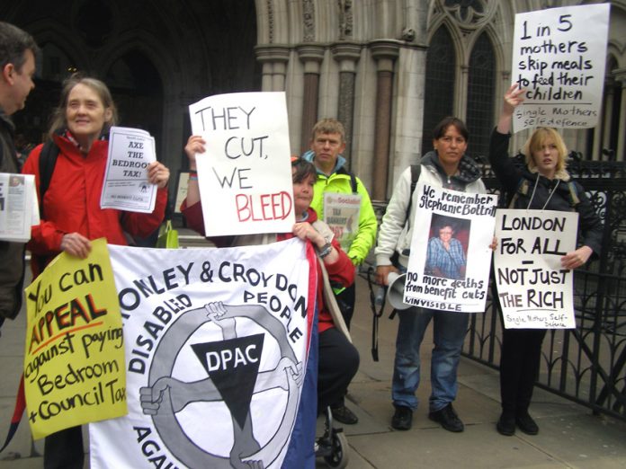 Workers outside the law courts fighting the bedroom tax and condemning the situation where mothers were skipping meals to feed their children