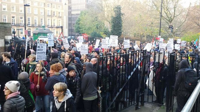 Students break through the locked gates at Senate House during their protest against police violence and management’s plan to close ULU