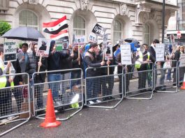 Torture, flogging and killings! AT ISLAMIC SECRET PRISONS SAYS AMNESTY Syrians in London picketing the Saudi Embassy in June in support of President Assad