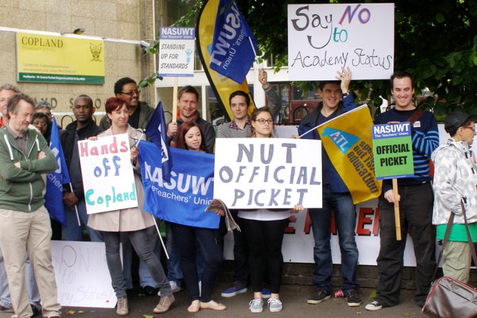 NUT and NASUWT teachers on the picket line at Copland Community School during strike action in July against becoming an academy