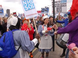 Nurses on a march and rally to stop the destruction of the NHS by the coalition government in central London in May last year