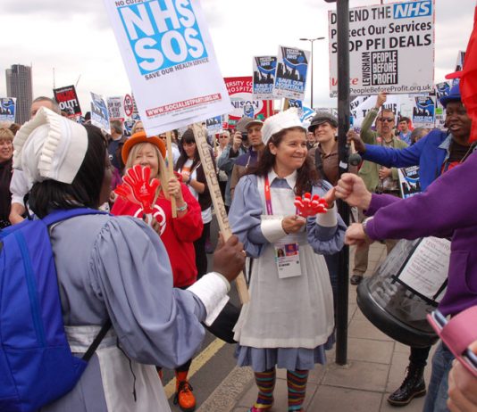Nurses on a march and rally to stop the destruction of the NHS by the coalition government in central London in May last year
