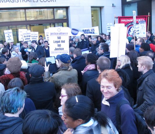 The over 200-strong demonstration against Legal Aid cuts outside Westminster Magistrates Court in London yesterday morning