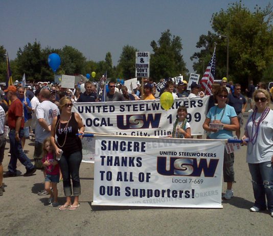 USW workers from Illinois thank supporters at a rally during their fight to defend jobs against their employer