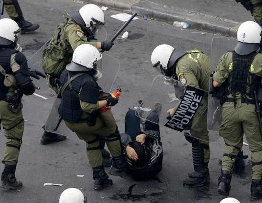 Greek riot police in action. UK Chancellor Osborne is demanding an EU-wide War on Welfare