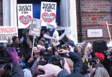 The Duggan family release doves at the end of the vigil outside Tottenham police station to emphasise the peaceful, but very determined nature of their protest