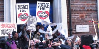 The Duggan family release doves at the end of the vigil outside Tottenham police station to emphasise the peaceful, but very determined nature of their protest