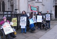 Campaigners outside the Royal Courts of Justice yesterday morning demanding ‘Axe the Bedroom Tax’