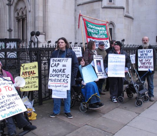 Campaigners outside the Royal Courts of Justice yesterday morning demanding ‘Axe the Bedroom Tax’