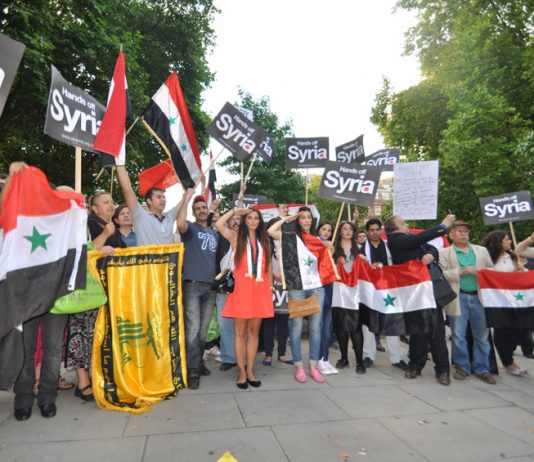 Syrians in London defend their country and picket the US embassy