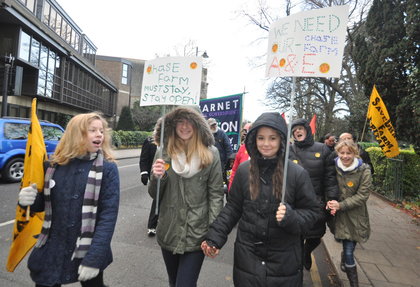 Youth join the march through Enfield Town on the day before the A&E at Chase Farm Hospital was closed last December