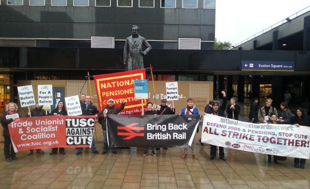 Trade unionists rally outside Euston Station demanding rail re-nationalisation – twenty years after it was privatised in 1993