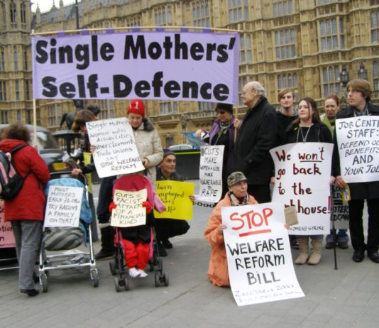 Demonstration in 2012 outside the House of Commons including mothers with children fighting against benefit cuts
