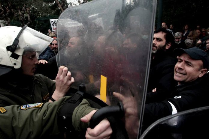 Riot police attacking teachers in Athens  Photo credit: M. Lolos