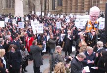 A section of the 3,000-strong rally of barristers, solicitors, probation staff and their supporters opposite parliament yesterday morning