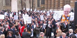 A section of the 3,000-strong rally of barristers, solicitors, probation staff and their supporters opposite parliament yesterday morning