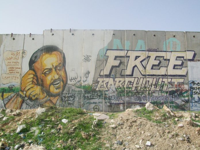Jailed Palestinian leader Marwan Barghouthi depicted on the separation wall