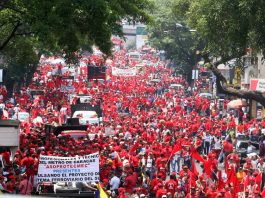 Thousands march in support of the Venezuelan government Venezuelan workers on a May Day demonstration