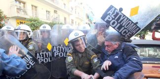 Armed riot police attack teachers outside the private office of the Reform Minister Mitsotakis   Photo credit: MARIOS LOLOS
