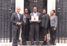 Streatham Labour MP CHUKA UMUNNA, LISA LAWRENCE, LEE LAWRENCE, ROSEMARY SPENCER and CHARMAINE LAVILLE before handing the Groce family petition into No 10