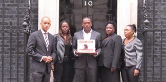 Streatham Labour MP CHUKA UMUNNA, LISA LAWRENCE, LEE LAWRENCE, ROSEMARY SPENCER and CHARMAINE LAVILLE before handing the Groce family petition into No 10