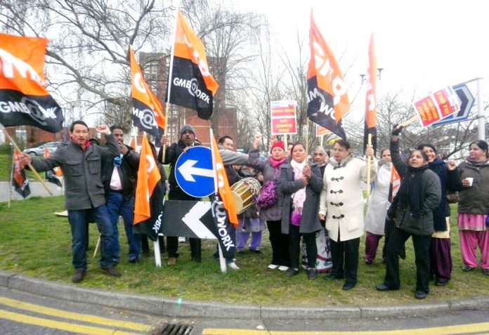 Ealing Hospital Medirest strikers on the picket line during their seven-day strike last month – they have now won a 16 per cent pay increase