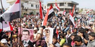 Syrians rally in Tartous in support of President Assad and the Syrian Army