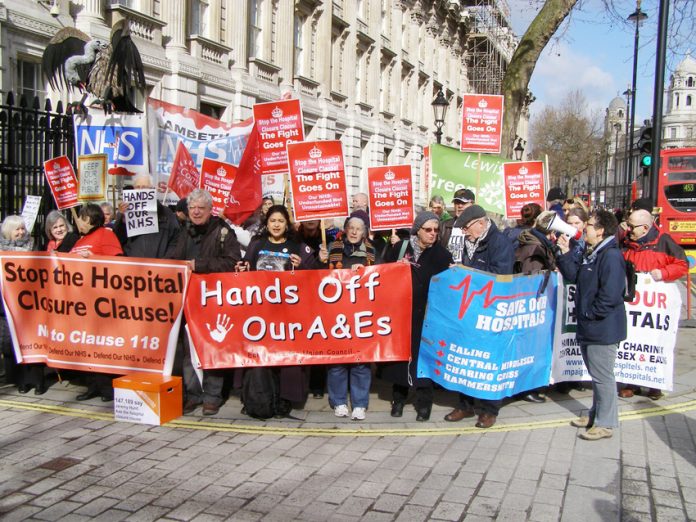 Protesters campaigning against the notorious claiuse 118/119 that allows Health Secretary Hunt to close hospitals at will
