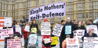 Mothers demonstrate outside the House of Commons against government benefit cuts