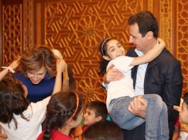 Syrian president BASHAR AL-ASSAD and his wife ASMA receiving sons and daughters of martyrs on Martyrs’ Day