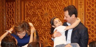 Syrian president BASHAR AL-ASSAD and his wife ASMA receiving sons and daughters of martyrs on Martyrs’ Day